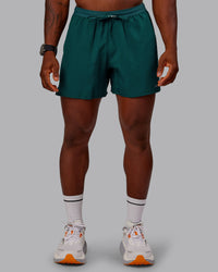 Man wearing Pace Lined Performance Short  5" in Dark Moss | Size:M | Thumbnail Index: 1