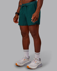 Man wearing Pace Lined Performance Short  5" in Dark Moss | Size:M | Thumbnail Index: 6