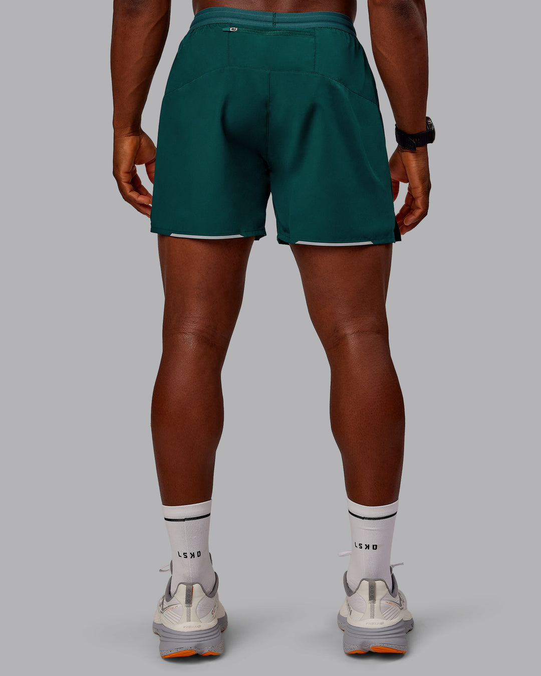 Man wearing Pace Lined Performance Short  5" in Dark Moss | Size:M - view 6