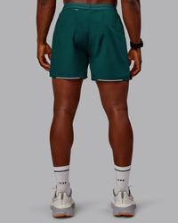Man wearing Pace Lined Performance Short  5" in Dark Moss | Size:M | Thumbnail Index: 5