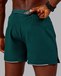 Man wearing Pace Lined Performance Short  5" in Dark Moss | Size:M | Thumbnail Index: 3
