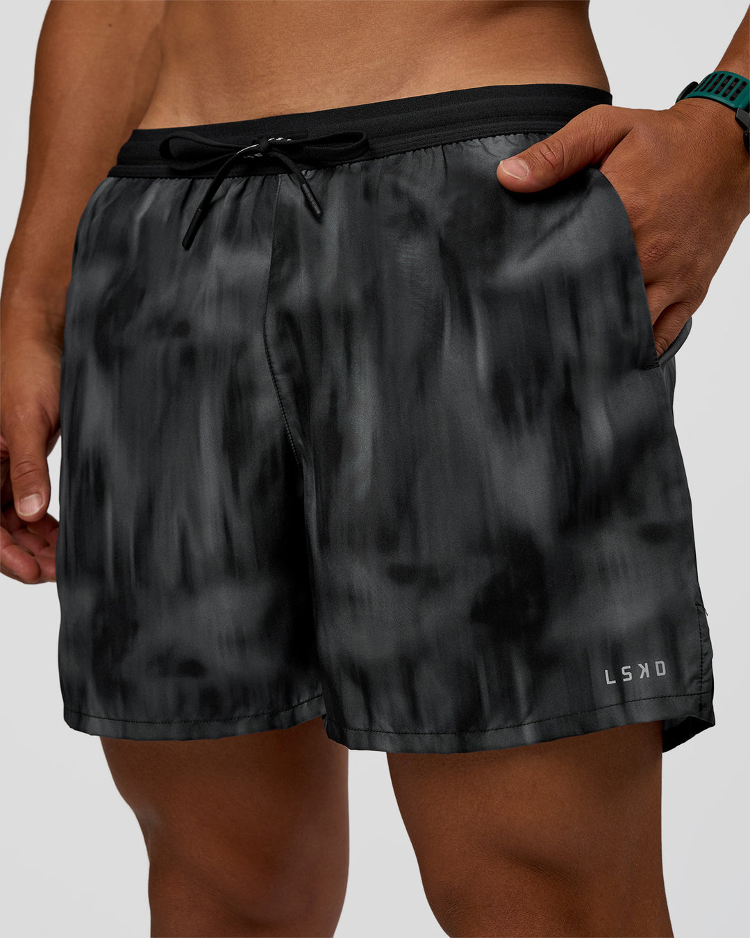 Man wearing Pace 5" Lined Running Short - Lunar Glow | Model:George | Size:M - view 1