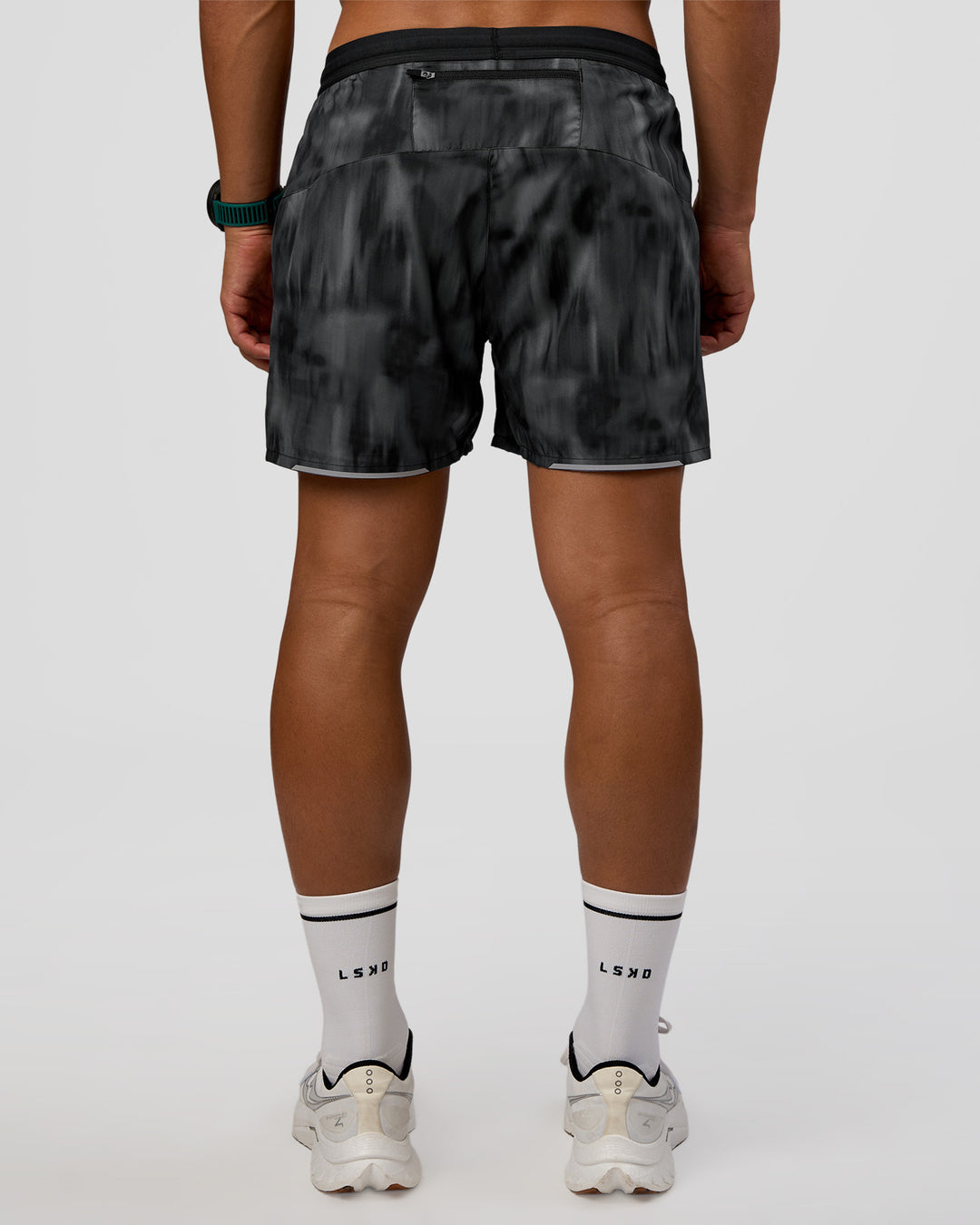 Man wearing Pace 5" Lined Running Short - Lunar Glow | Model:George | Size:M - view 4