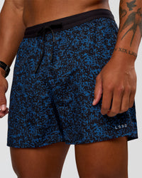 Man wearing Pace 5" Lined Running Short - Energy Print Palace Blue | Model:Malebo | Size:M | Thumbnail Index: 9