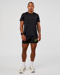 Man wearing Pace 5" Lined Running Short - Black-Lime Glo Indigo | Model:Malebo | Size:M | Thumbnail Index: 6