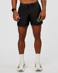 Man wearing Pace 5" Lined Running Short - Black-Lime Glo Indigo | Model:Malebo | Size:M | Thumbnail Index: 2