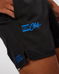 Man wearing Pace 5" Lined Running Short - Black-Lime Glo Indigo | Model:Malebo | Size:M | Thumbnail Index: 1