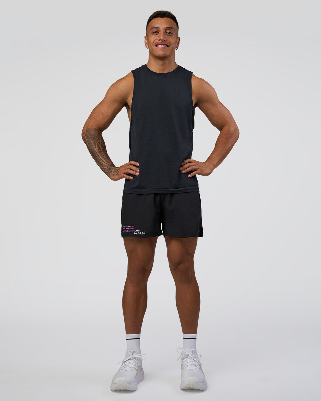 Man wearing Pace 5" Lined Running Short - Black-Ultra Fuchsia | Model:Daarian | Size:M - view 3