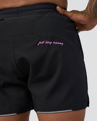 Man wearing Pace 5" Lined Running Short - Black-Ultra Fuchsia | Model:Daarian | Size:M | Thumbnail Index: 8