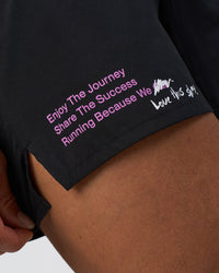 Man wearing Pace 5" Lined Running Short - Black-Ultra Fuchsia | Model:Daarian | Size:M | Thumbnail Index: 4