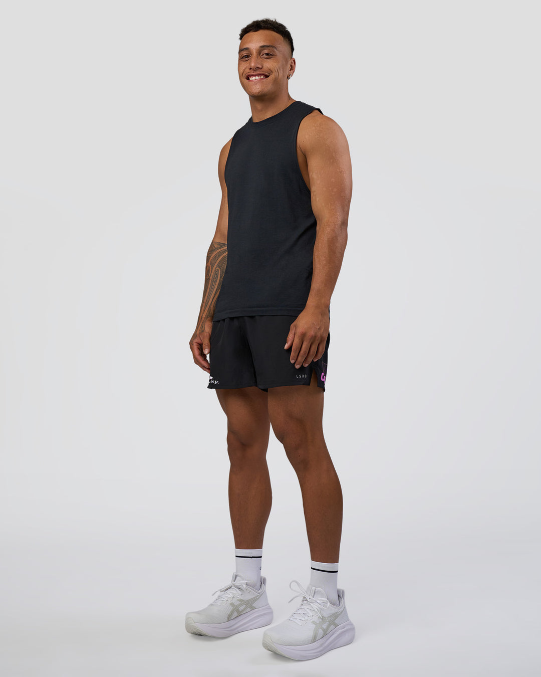 Man wearing Pace 5" Lined Running Short - Black-Ultra Fuchsia | Model:Daarian | Size:M - view 7