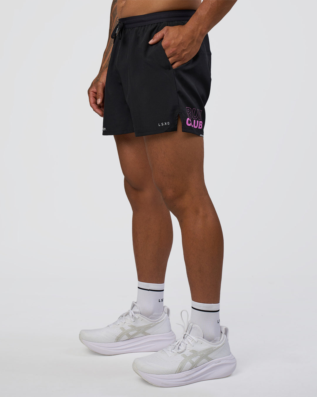 Man wearing Pace 5" Lined Running Short - Black-Ultra Fuchsia | Model:Daarian | Size:M - view 2