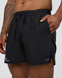 Man wearing Pace 5" Lined Running Short - Black-Ultra Fuchsia | Model:Daarian | Size:M | Thumbnail Index: 5