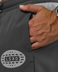 Man wearing Pace 5" Lined Running Short - Dark Storm-Alloy | Model:Jaiden | Size:M | Thumbnail Index: 8