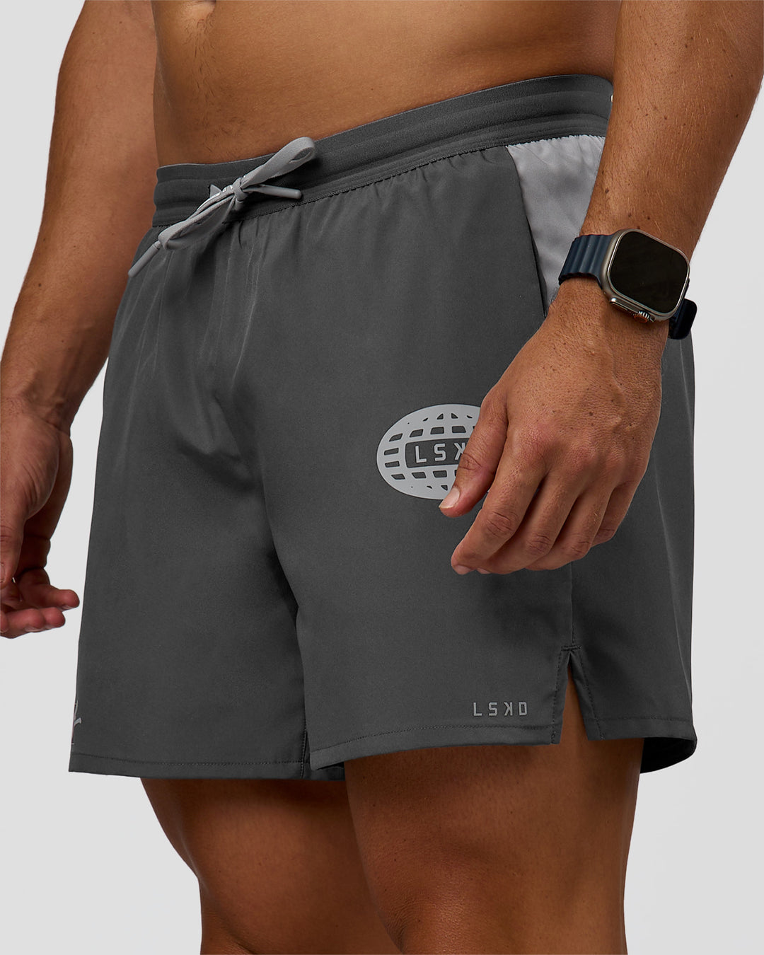 Man wearing Pace 5" Lined Running Short - Dark Storm-Alloy | Model:Jaiden | Size:M - view 7