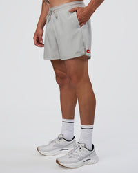 Man wearing Pace 5" Lined Running Short - Digital Mist-Flame | Model:Konnor | Size:M | Thumbnail Index: 8