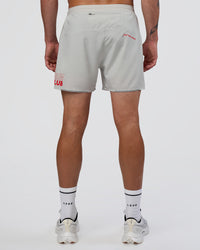 Man wearing Pace 5" Lined Running Short - Digital Mist-Flame | Model:Konnor | Size:M | Thumbnail Index: 3