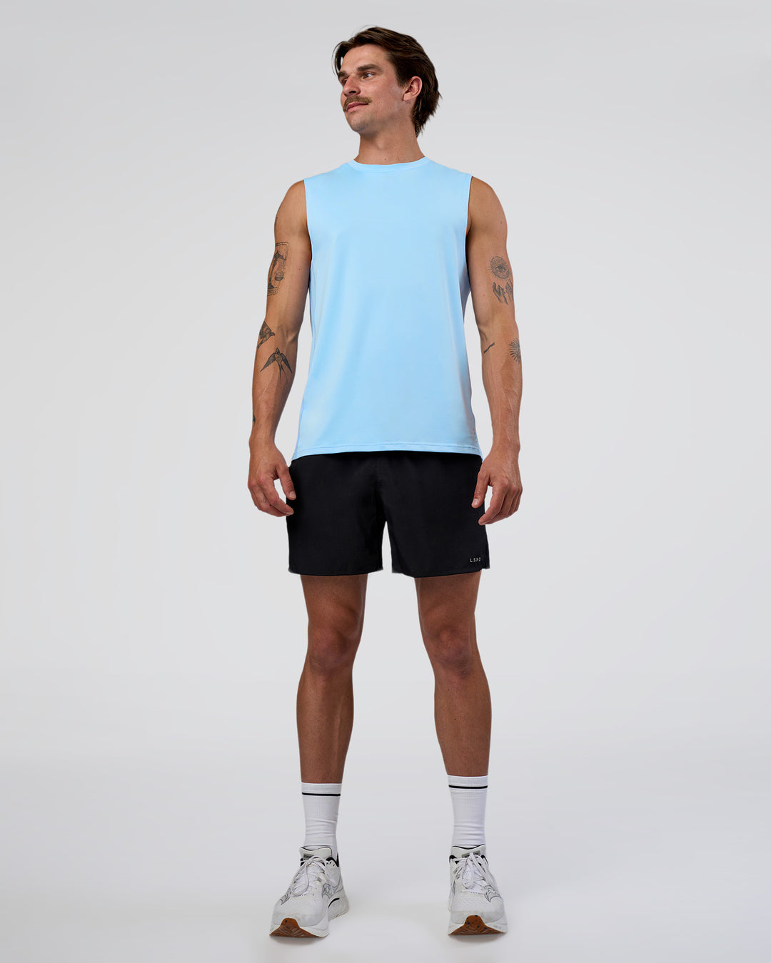 Man wearing Pace 5" Running Short - Black | Model:Konnor | Size:M - view 6