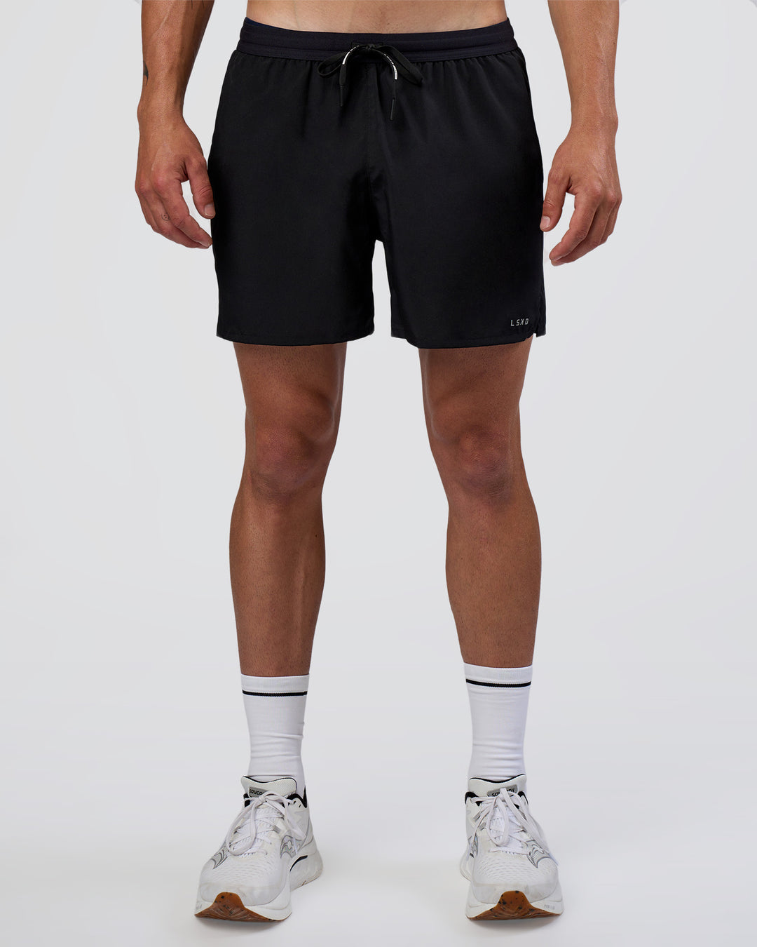 Man wearing Pace 5" Running Short - Black | Model:Konnor | Size:M - view 1