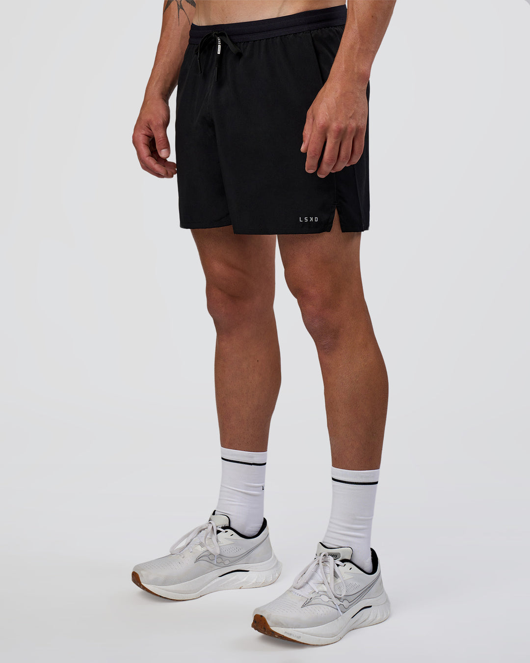 Man wearing Pace 5" Running Short - Black | Model:Konnor | Size:M - view 8