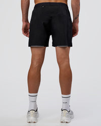 Man wearing Pace 5" Running Short - Black | Model:Konnor | Size:M | Thumbnail Index: 3