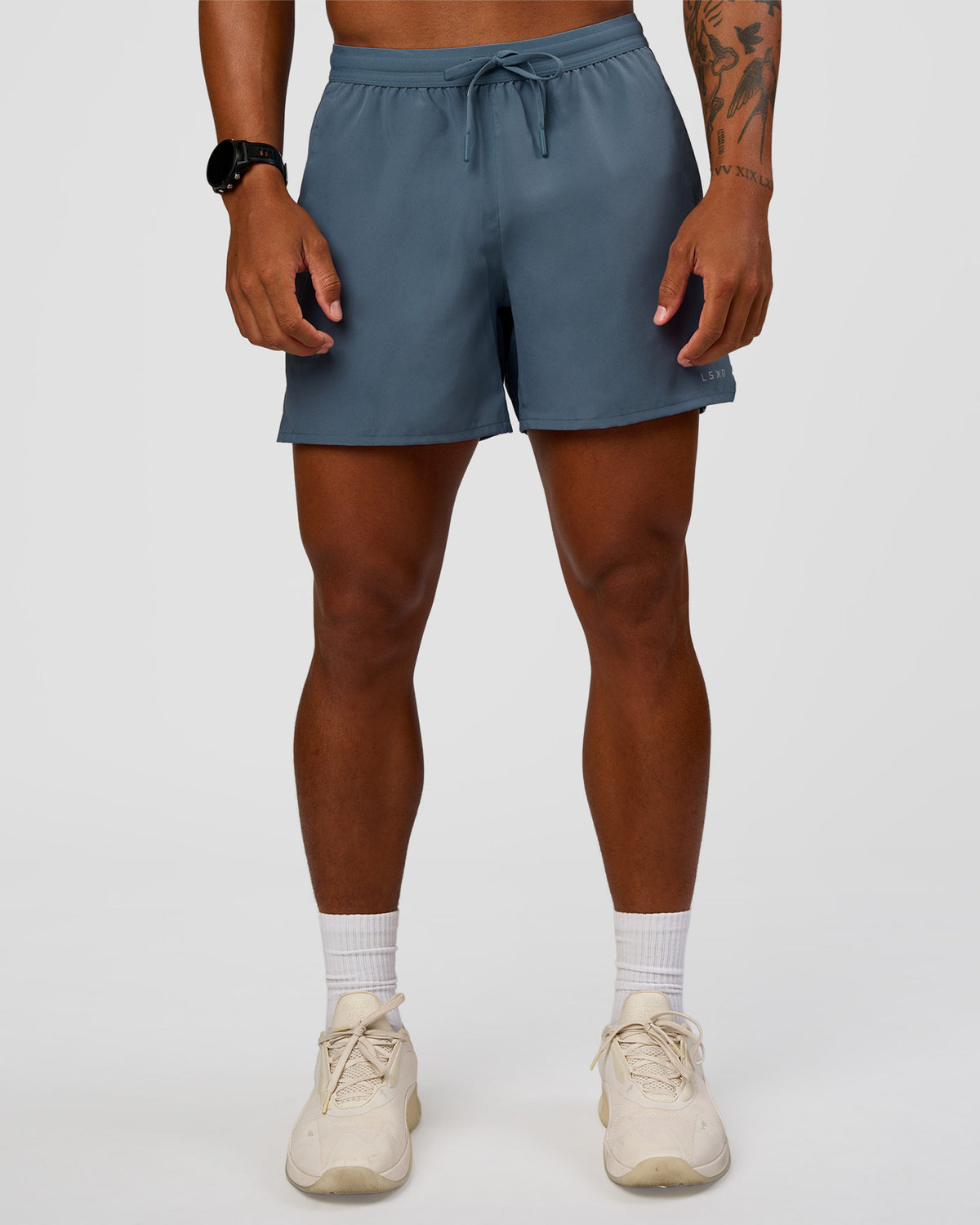 Man wearing Pace 5" Running Short - Blue Mirage | Model:Malebo | Size:M