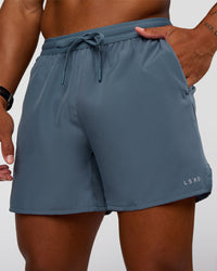 Man wearing Pace 5" Running Short - Blue Mirage | Model:Malebo | Size:M | Thumbnail Index: 4