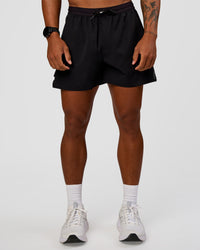 Man wearing Pace Air 5" Lined Running Short - Black | Model:Malebo | Size:M | Thumbnail Index: 0