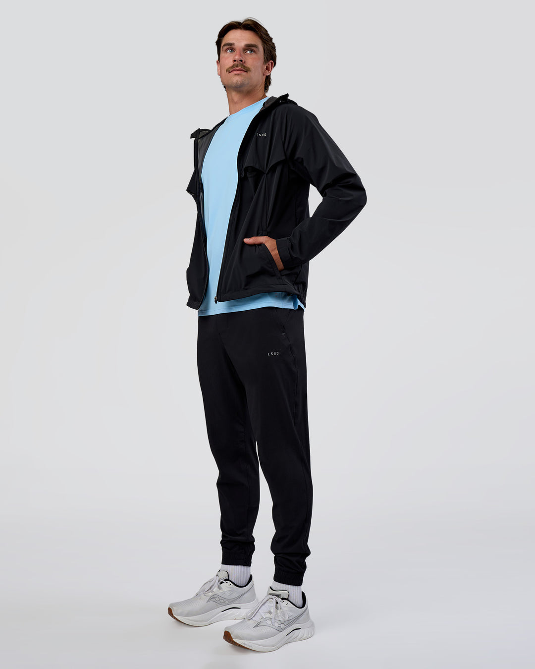 Man wearing Pace Running Jacket - Black | Model:Konnor | Size:M - view 8