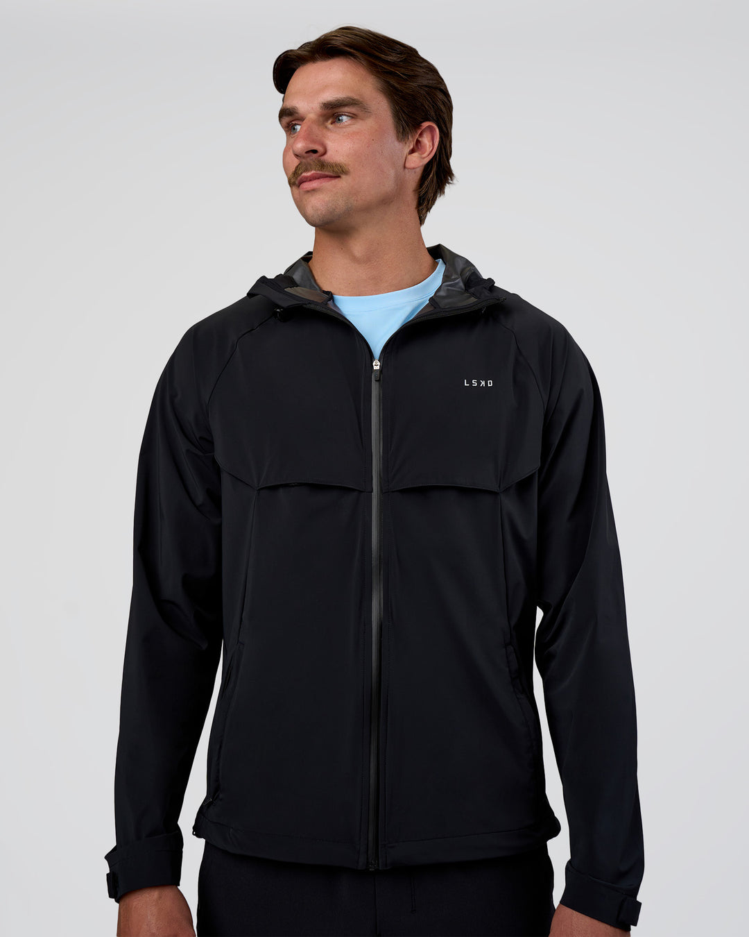Man wearing Pace Running Jacket - Black | Model:Konnor | Size:M - view 1