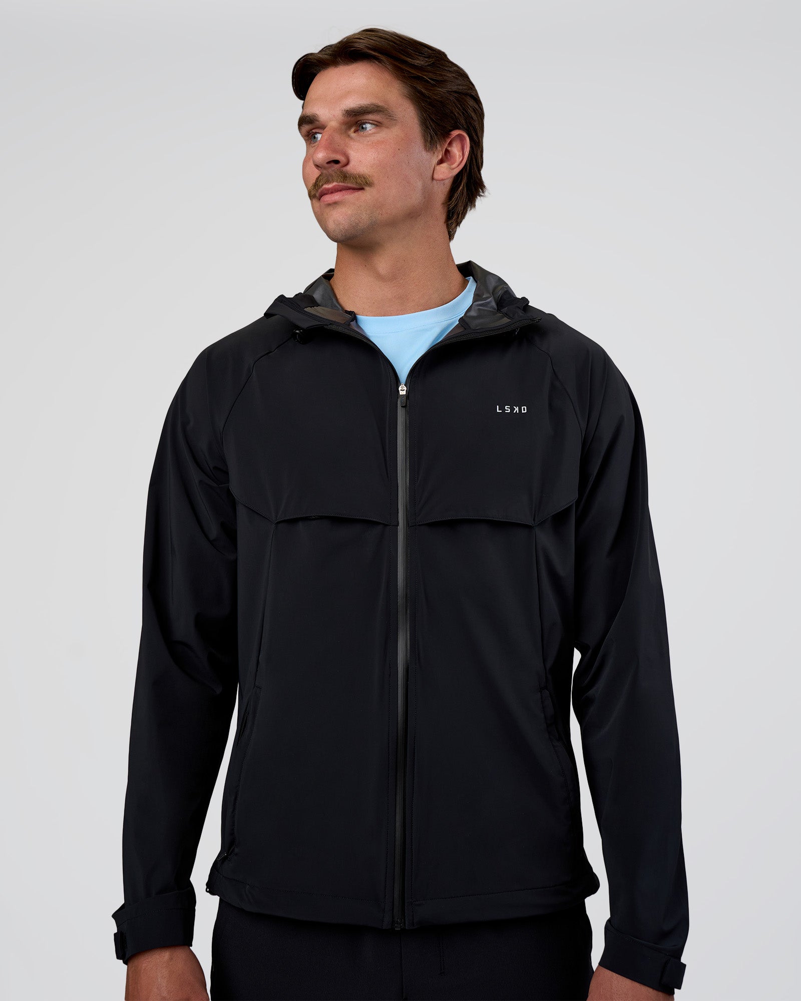 Man wearing Pace Running Jacket - Black | Model:Konnor | Size:M