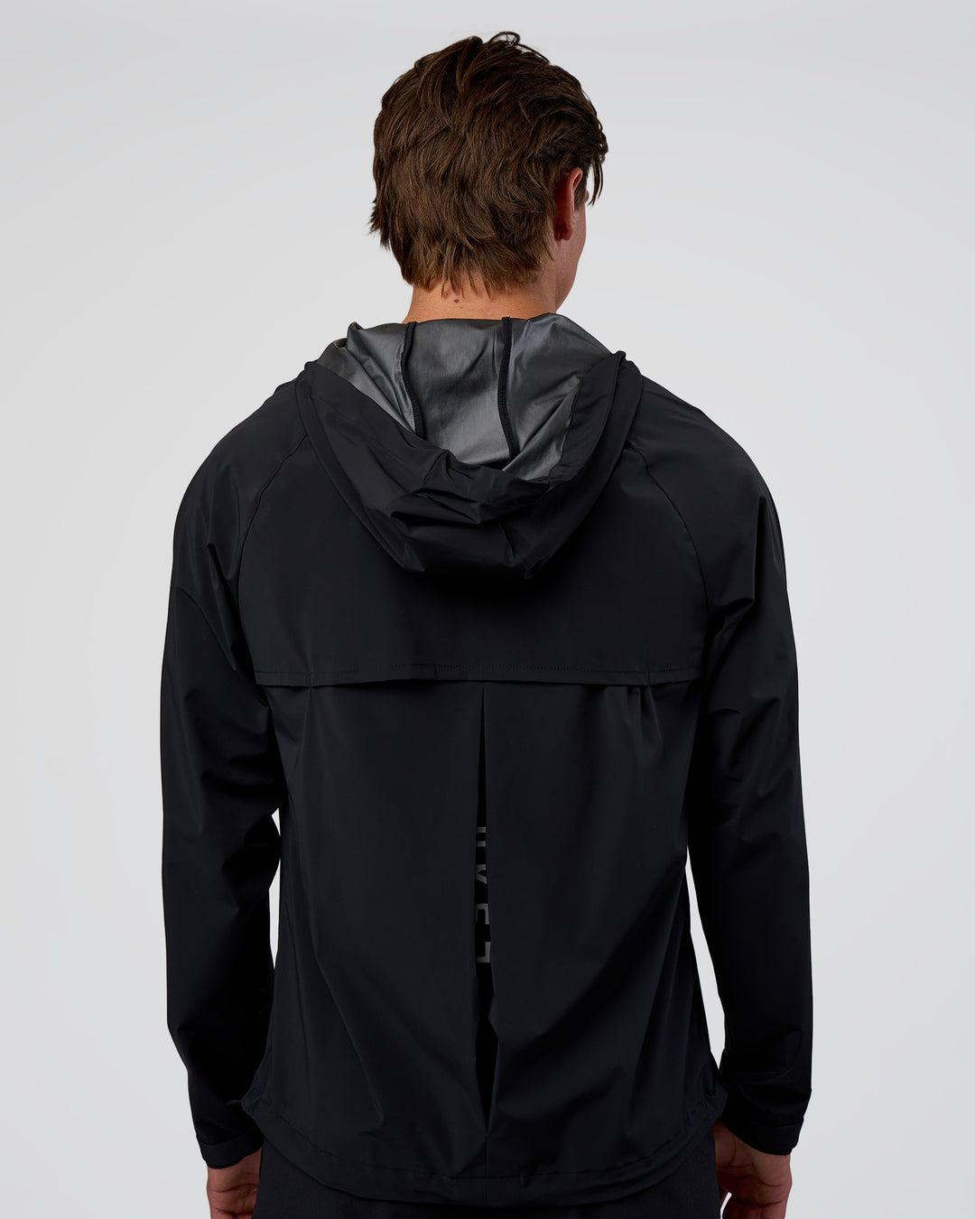 Man wearing Pace Running Jacket - Black | Model:Konnor | Size:M - view 16
