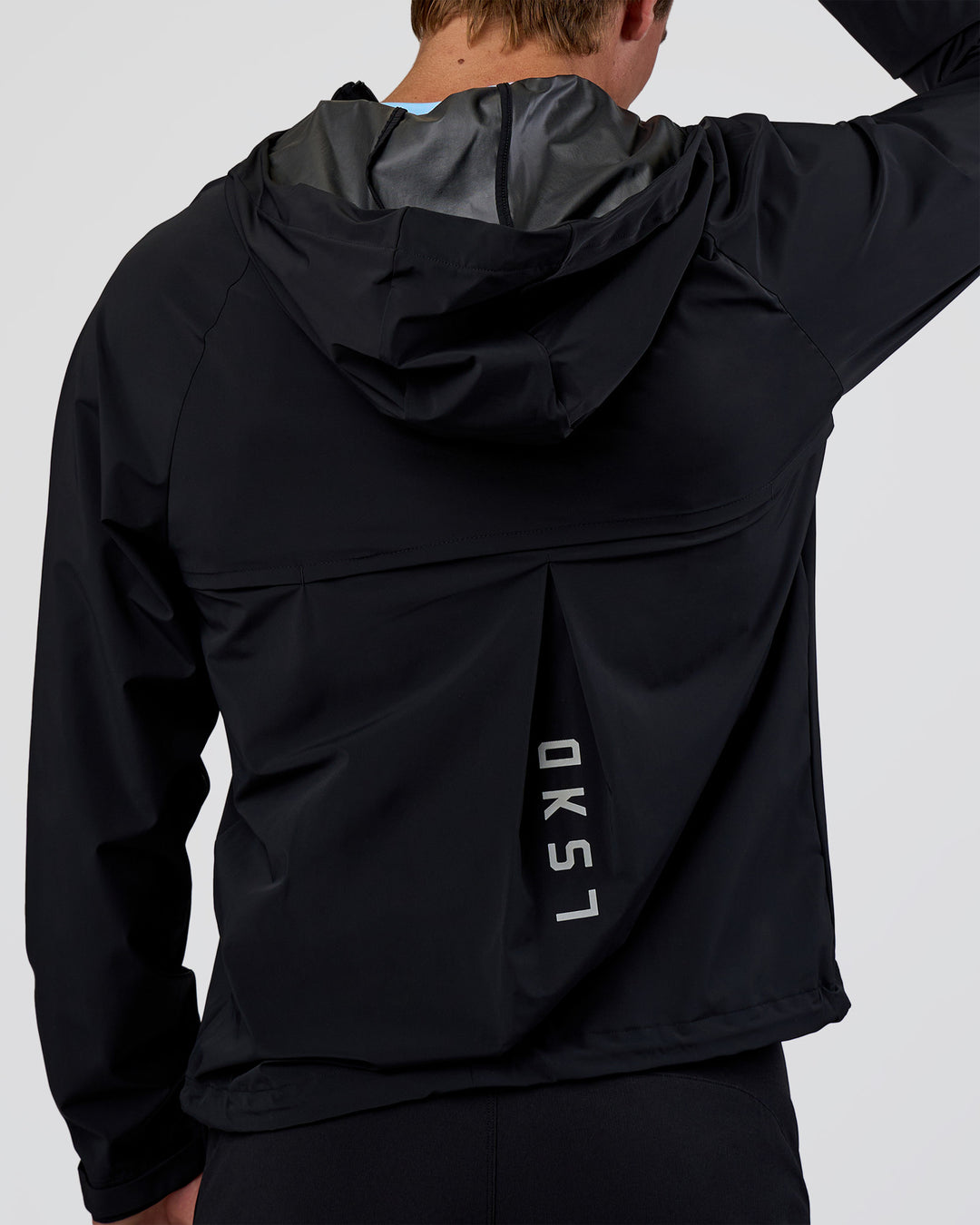 Man wearing Pace Running Jacket - Black | Model:Konnor | Size:M - view 7