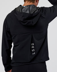 Man wearing Pace Running Jacket - Black | Model:Konnor | Size:M | Thumbnail Index: 6
