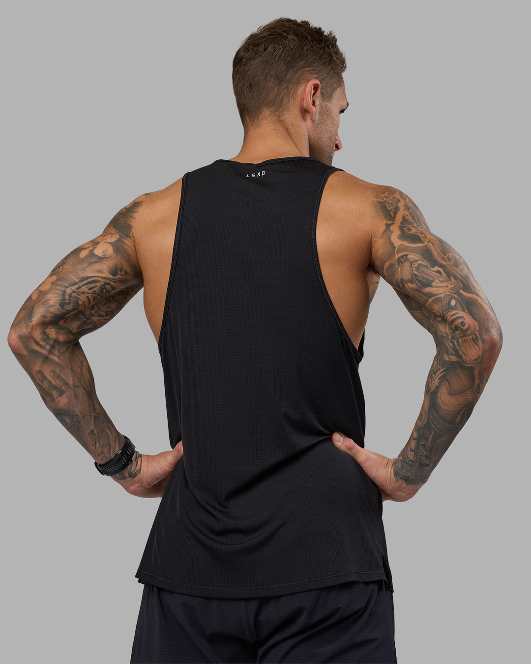 Man wearing Pace Running Tank - Black | Model:Tommy | Size:M - view 8