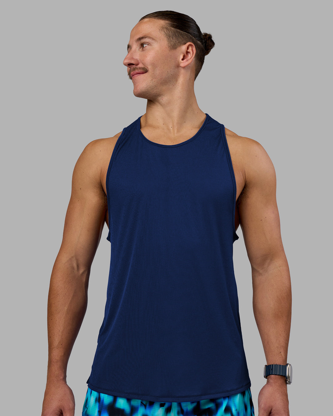 Man wearing Pace Running Tank - Midnight Blue | Model:Jaiden | Size:M - view 1