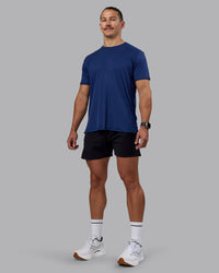 Man wearing Pace Running Tee - Midnight Blue | Model:Jaiden | Size:M | Thumbnail Index: 1