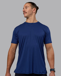 Man wearing Pace Running Tee - Midnight Blue | Model:Jaiden | Size:M | Thumbnail Index: 0