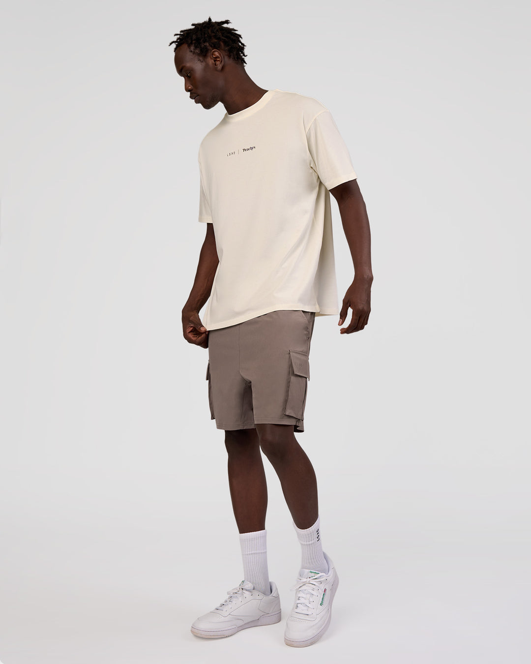 Man wearing Peaches x LSKD Collection FLXCotton Oversize Tee - Off White | Model:Okello | Size:M - view 14