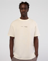 Man wearing Peaches x LSKD Collection FLXCotton Oversize Tee - Off White | Model:Okello | Size:M | Thumbnail Index: 4