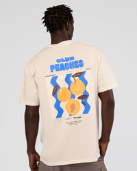 Man wearing Peaches x LSKD Collection FLXCotton Oversize Tee - Off White | Model:Okello | Size:M | Thumbnail Index: 3