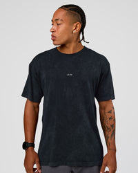 Man wearing Power Oversized Tee - Black Washed | Model:Malebo | Size:M | Thumbnail Index: 0
