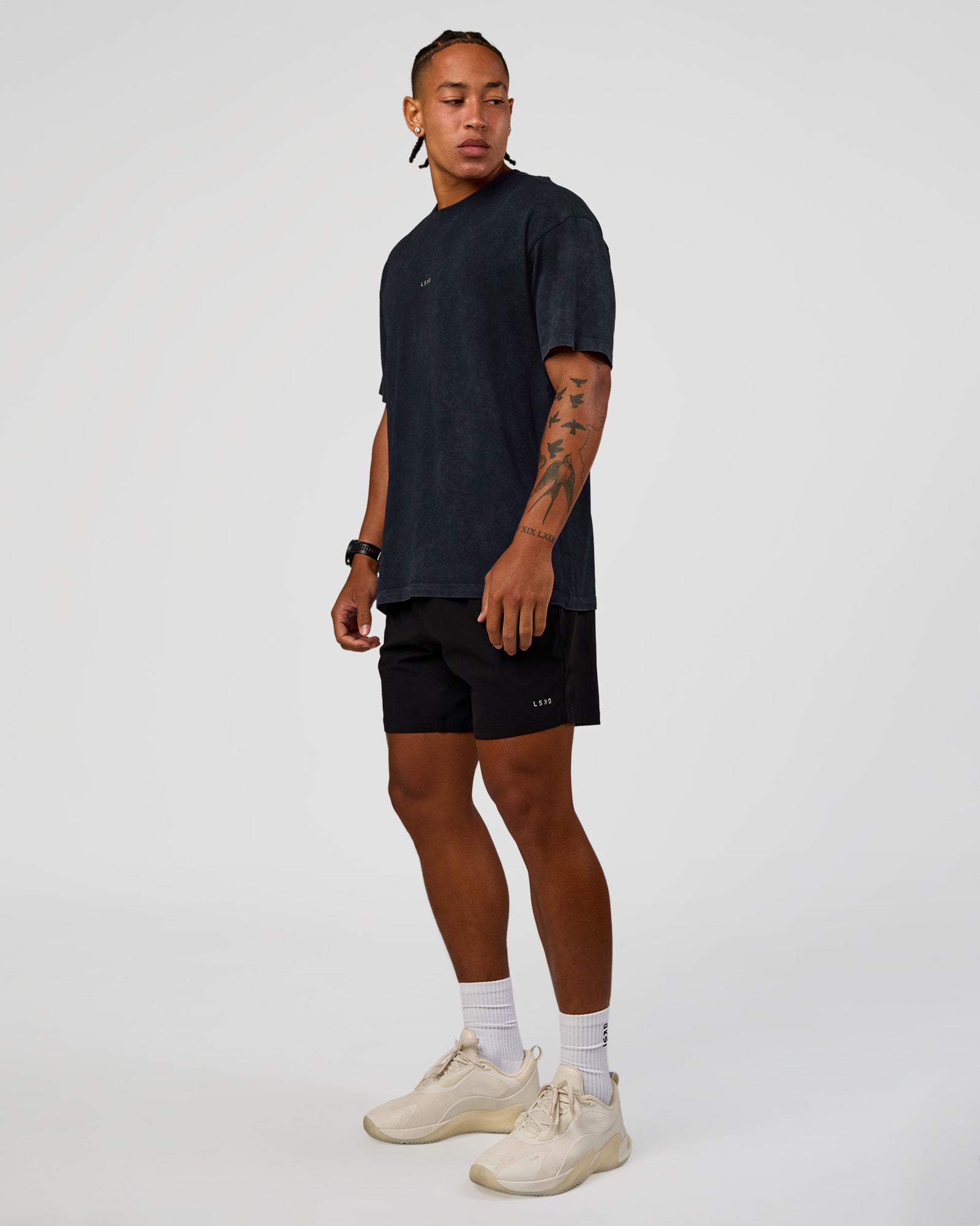 Man wearing Power Oversized Tee - Black Washed | Model:Malebo | Size:M