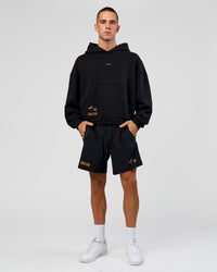 Man wearing Pride Sticker Boxy Hoodie - Black | Model:Albert | Size:M | Thumbnail Index: 14