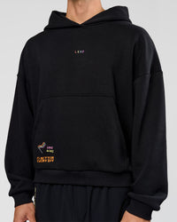Man wearing Pride Sticker Boxy Hoodie - Black | Model:Albert | Size:M | Thumbnail Index: 6