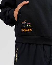 Man wearing Pride Sticker Boxy Hoodie - Black | Model:Albert | Size:M | Thumbnail Index: 5