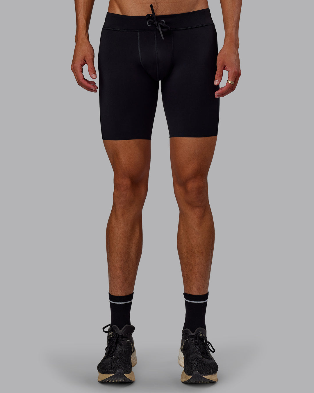 Man wearing Race Day Short Tight 8" in Black | Model:Jaxon | Size:M - view 5