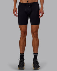 Man wearing Race Day Short Tight 8" in Black | Model:Jaxon | Size:M | Thumbnail Index: 4