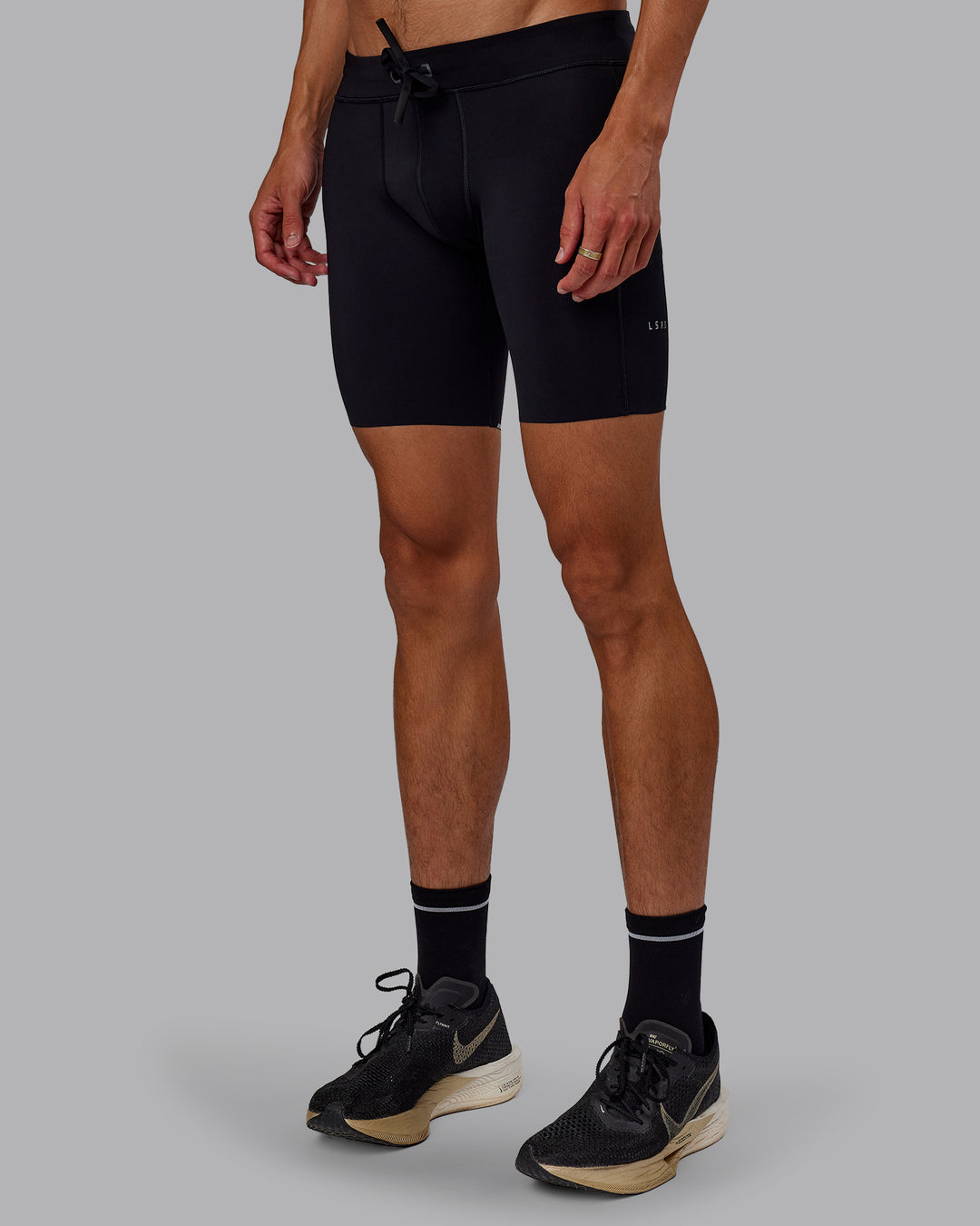 Man wearing Race Day Short Tight 8" in Black | Model:Jaxon | Size:M - view 7