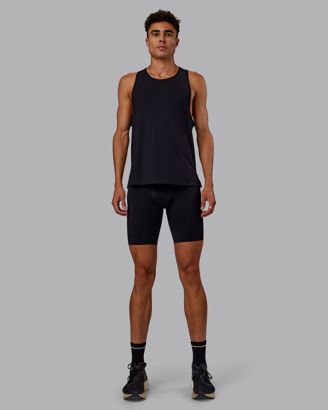 Man wearing Race Day Short Tight 8" in Black | Model:Jaxon | Size:M - view 6